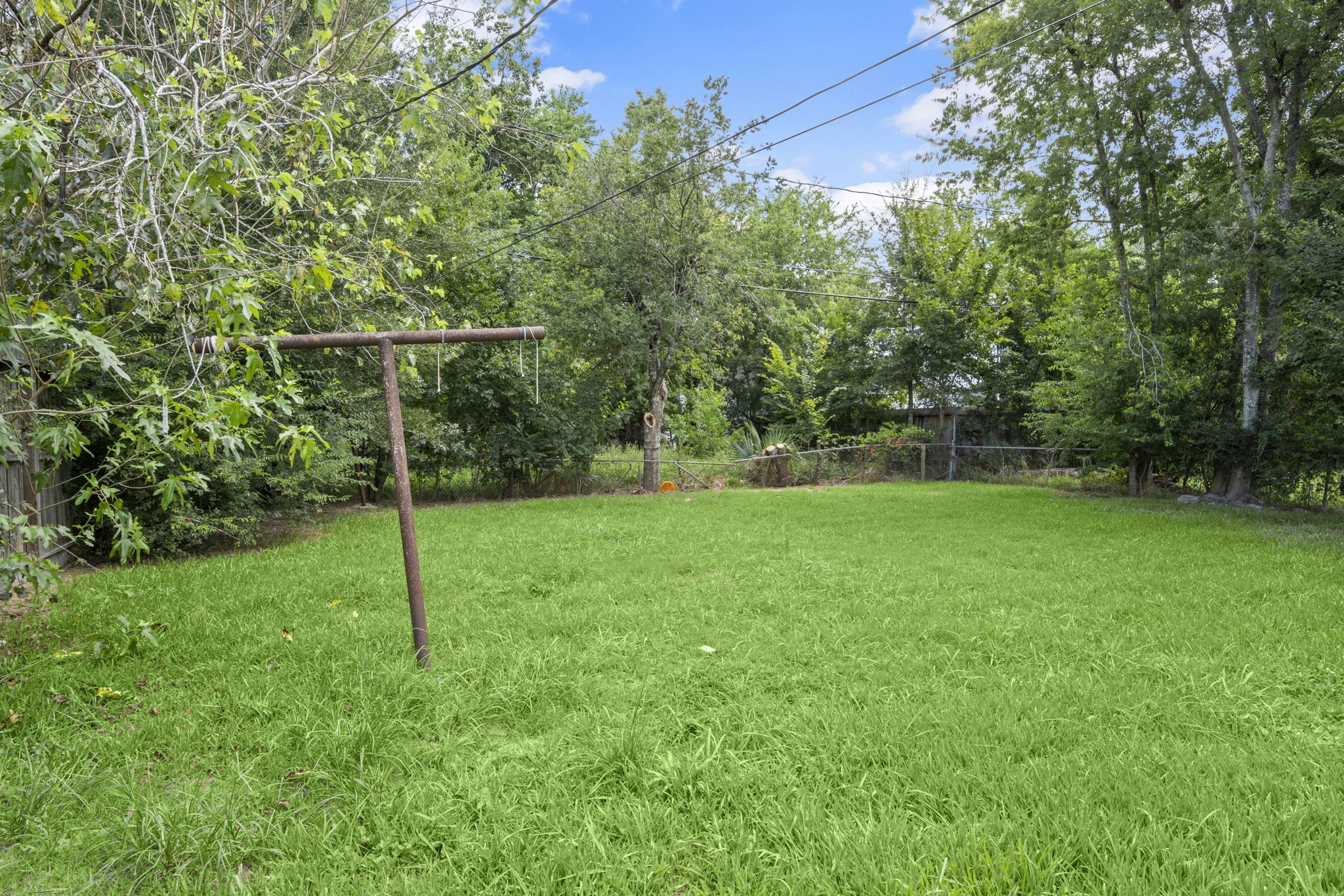 5219 Myrtlewood Street Houston, TX 77033 - Photo 33 of 36 a view of a yard with a slide