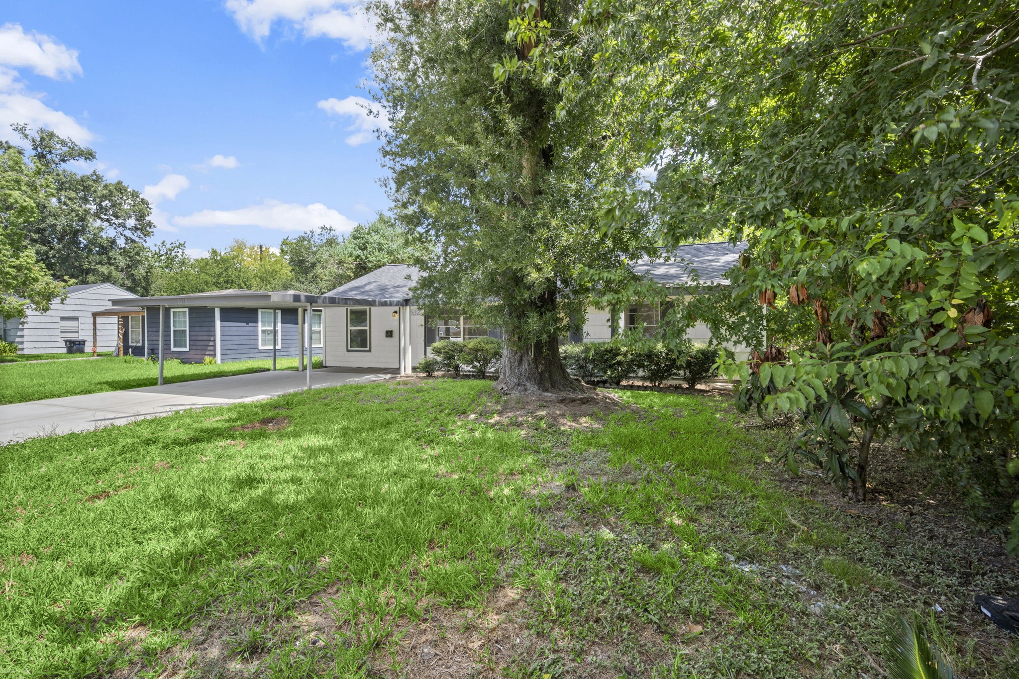 5219 Myrtlewood Street Houston, TX 77033 - Photo 34 of 36 a view of a house with backyard and sitting area