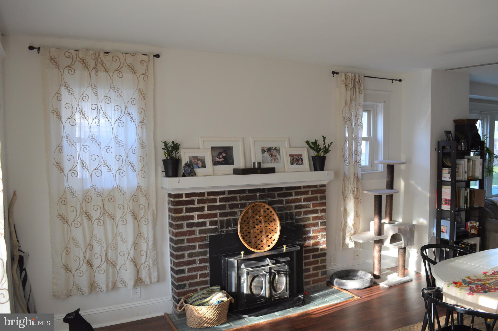 17 West Roland Road Brookhaven, PA 19015 - Photo 6 of 30 Dining area with decorative Fireplace