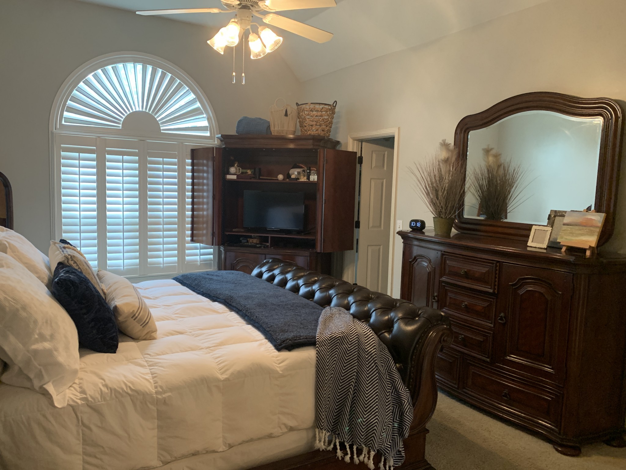 182 Scotsman Lane Franklin, TN 37064 - Photo 14 of 26 a bedroom with a bed and a mirror