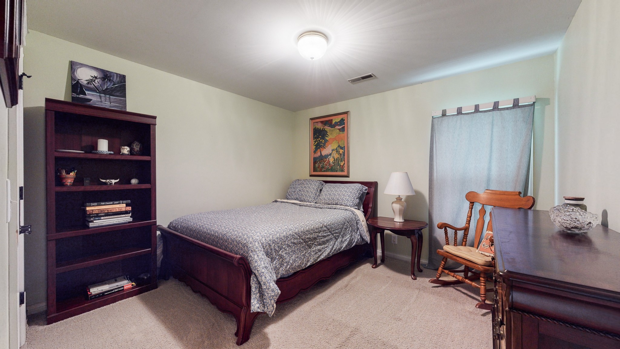 182 Scotsman Lane Franklin, TN 37064 - Photo 19 of 26 a room with a bed and a chair in it