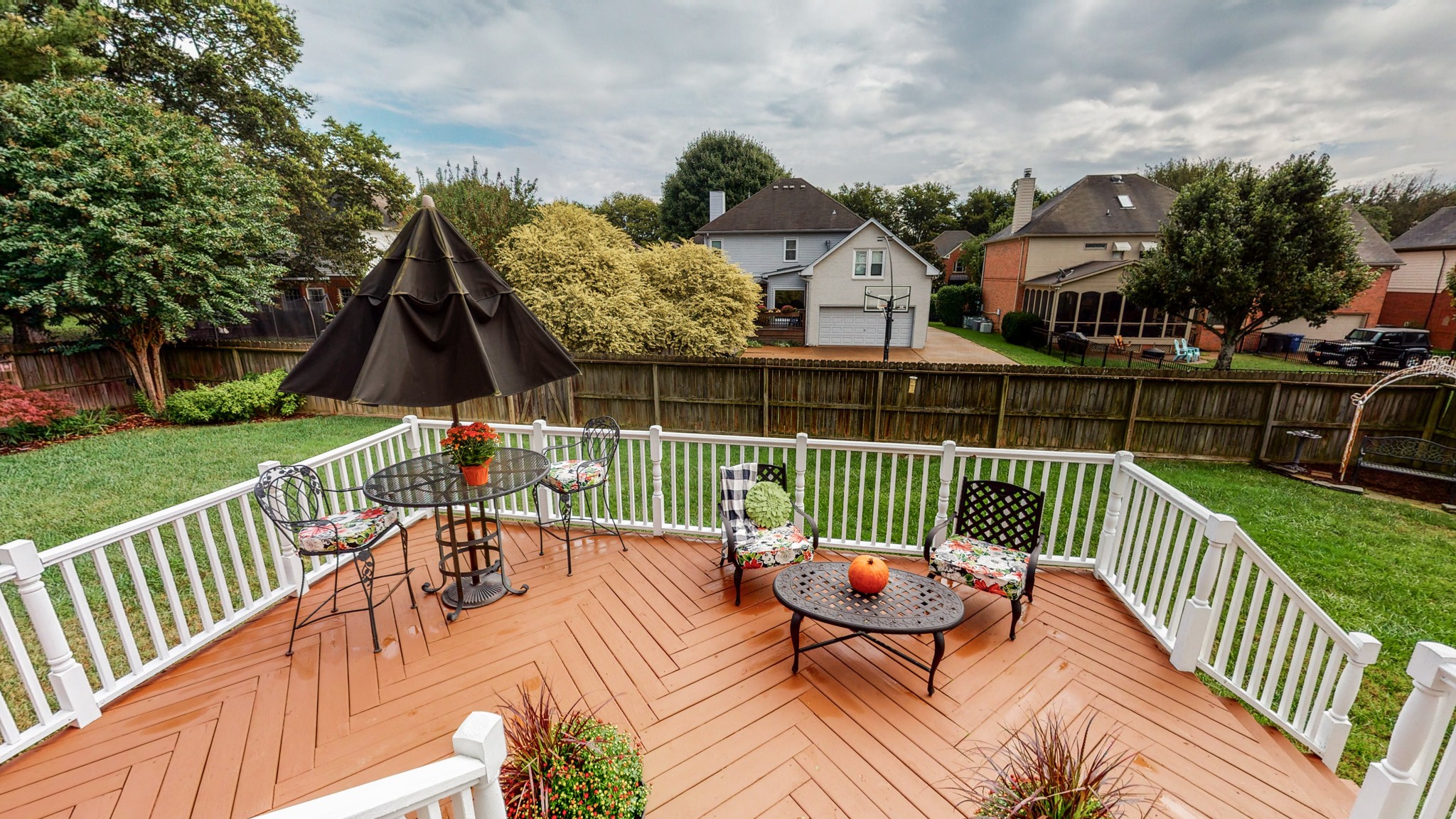 182 Scotsman Lane Franklin, TN 37064 - Photo 21 of 26 a view of a roof deck with couches and wooden floor