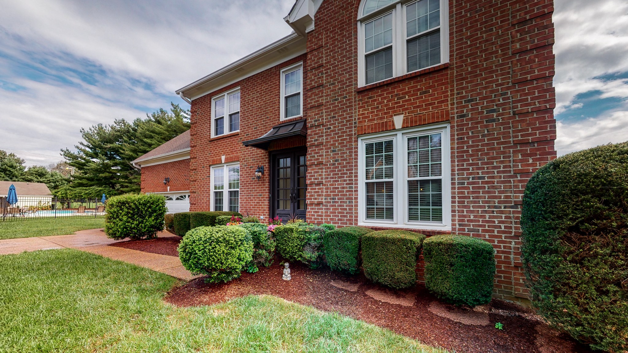 182 Scotsman Lane Franklin, TN 37064 - Photo 3 of 26 a front view of a house with a yard