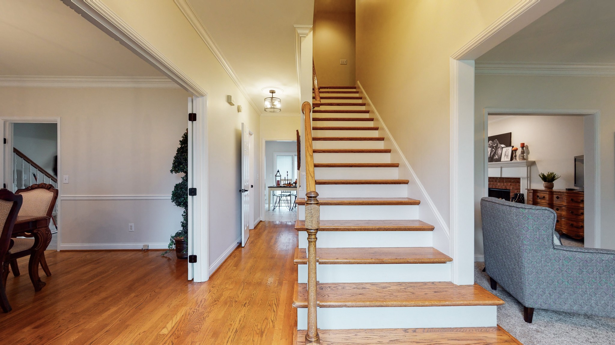 182 Scotsman Lane Franklin, TN 37064 - Photo 5 of 26 a view of entryway and hall with wooden floor