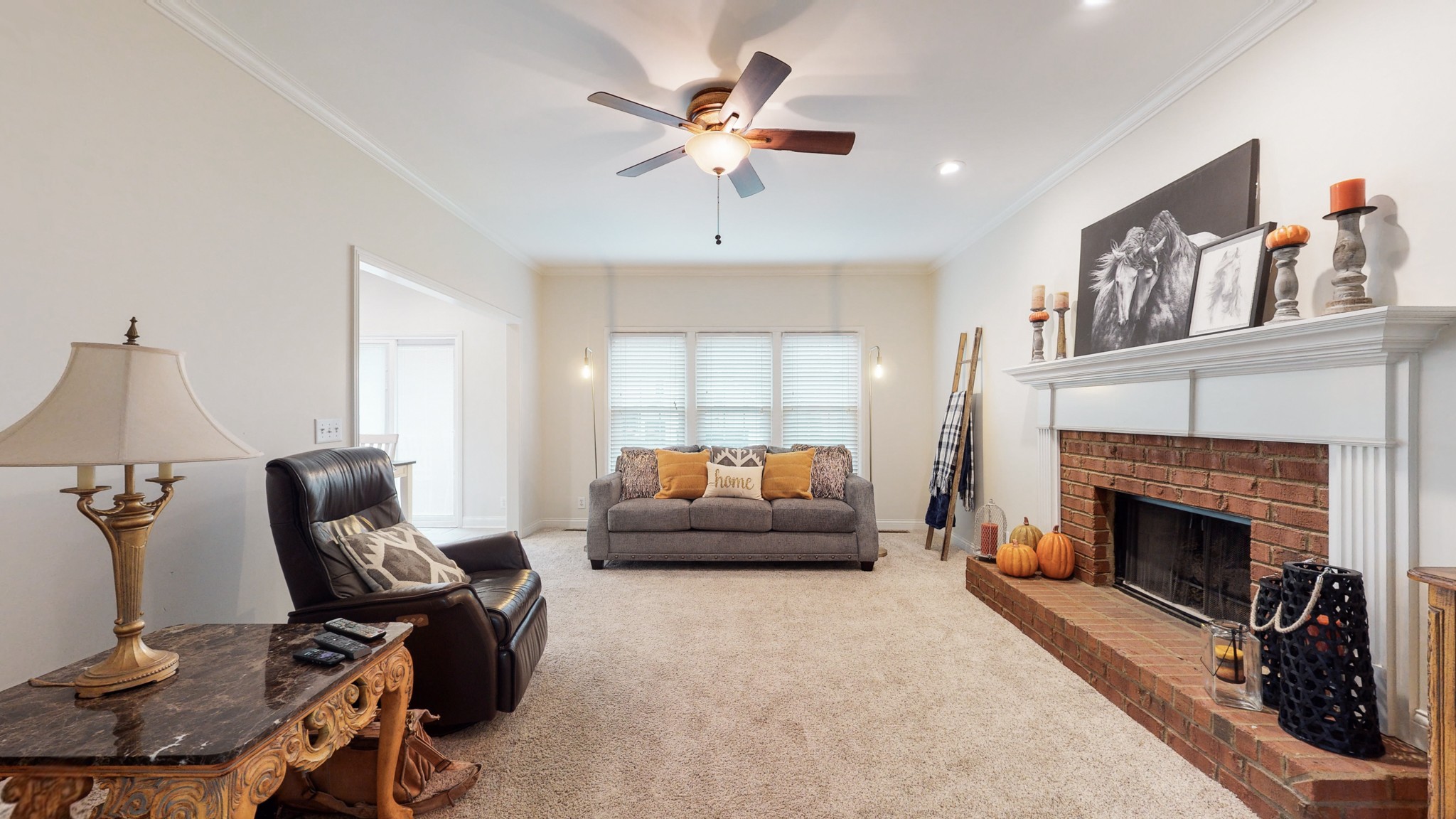 182 Scotsman Lane Franklin, TN 37064 - Photo 7 of 26 a living room with furniture and a fireplace