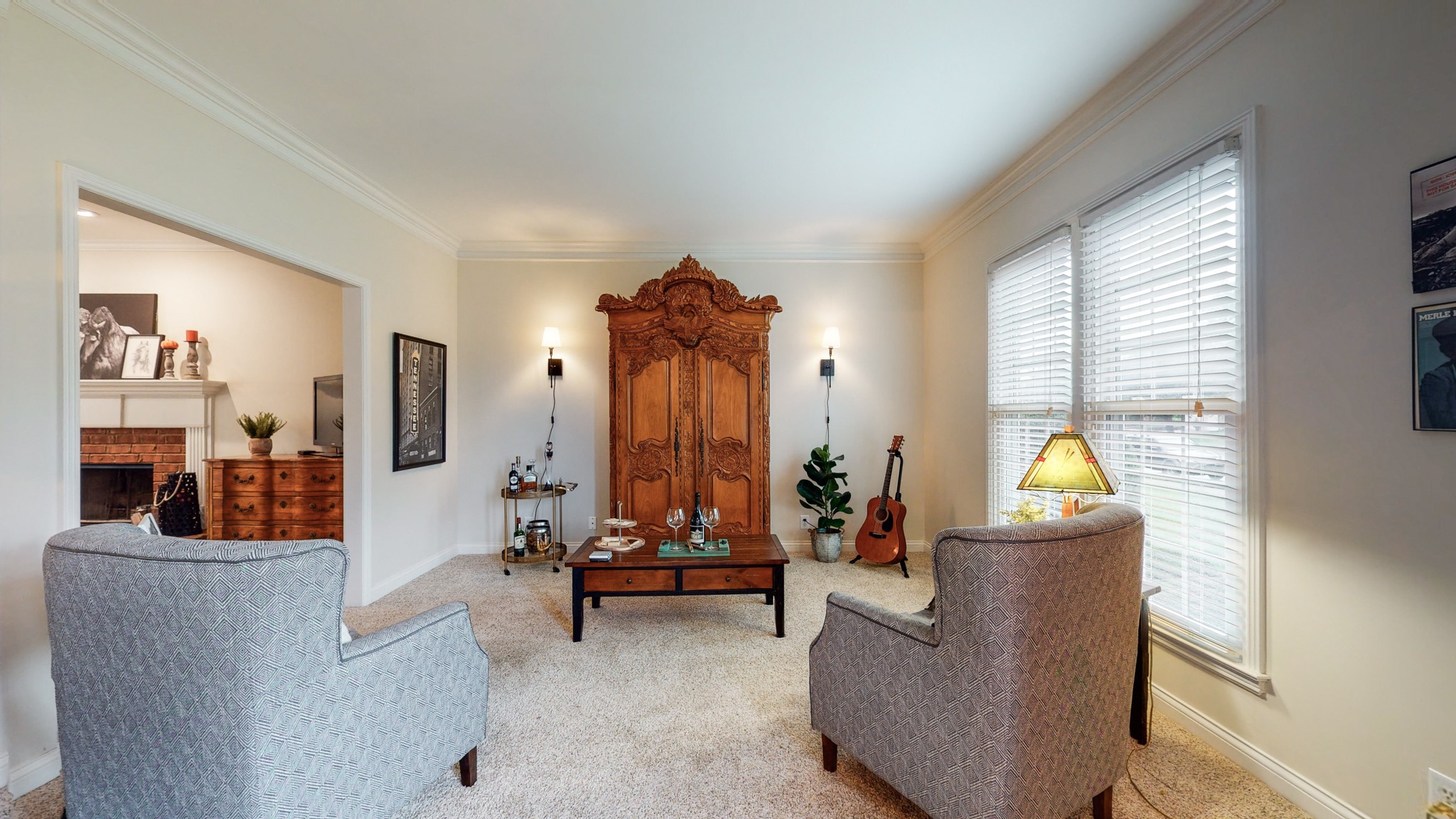 182 Scotsman Lane Franklin, TN 37064 - Photo 8 of 26 a living room with furniture and a chandelier