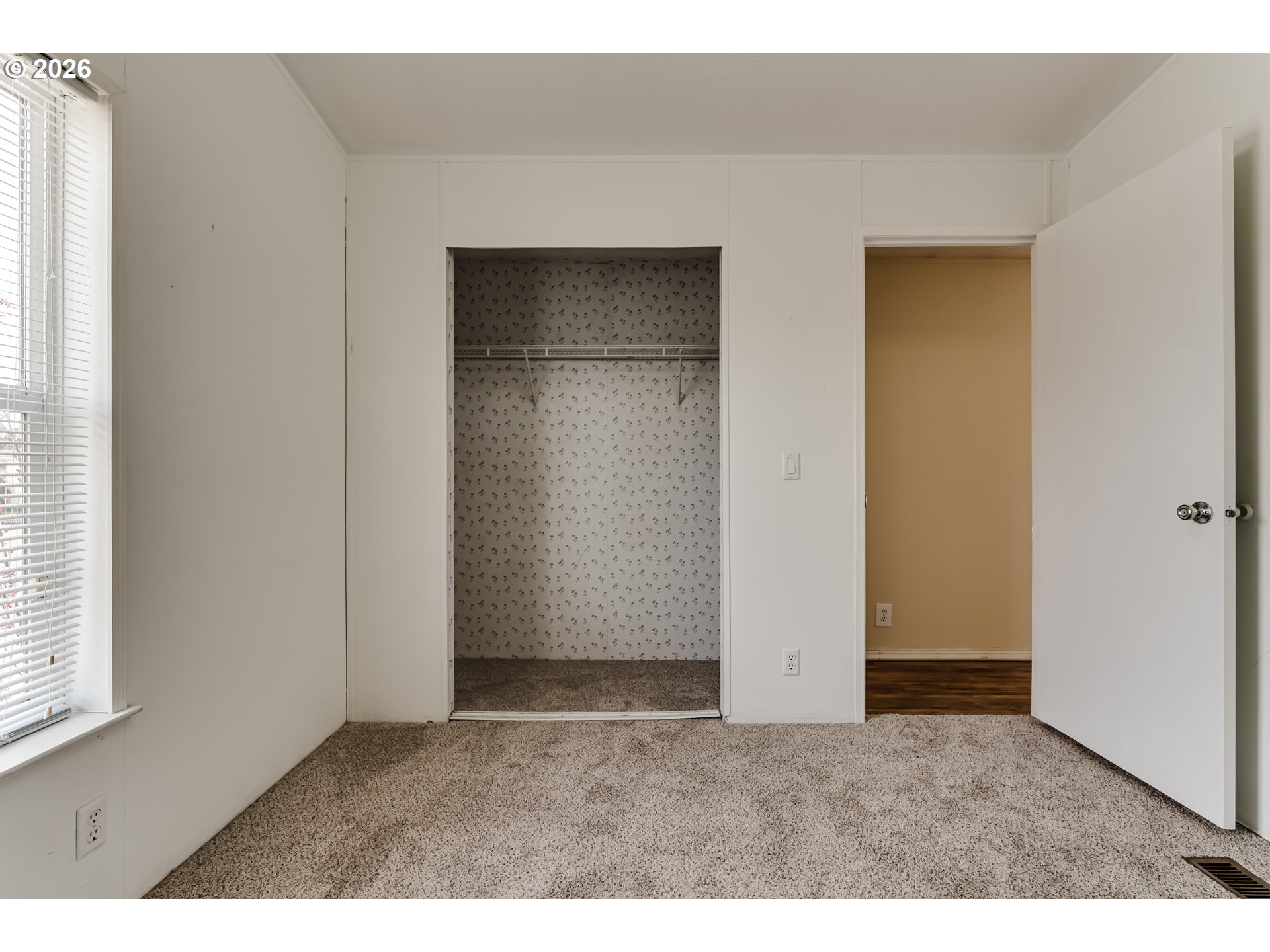 1699 North Terry Street Eugene, OR 97402 - Photo 12 of 30 an empty room with windows and closet
