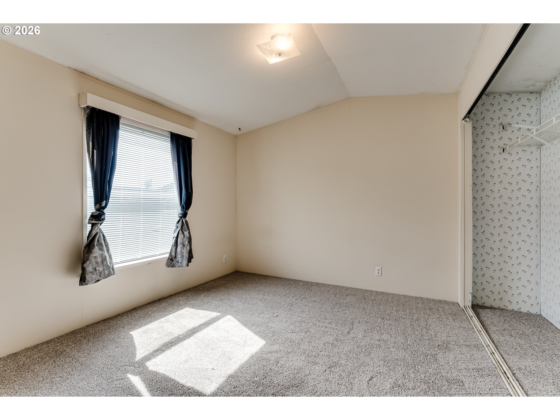 1699 North Terry Street Eugene, OR 97402 - Photo 10 of 30 a view of an empty room with a window