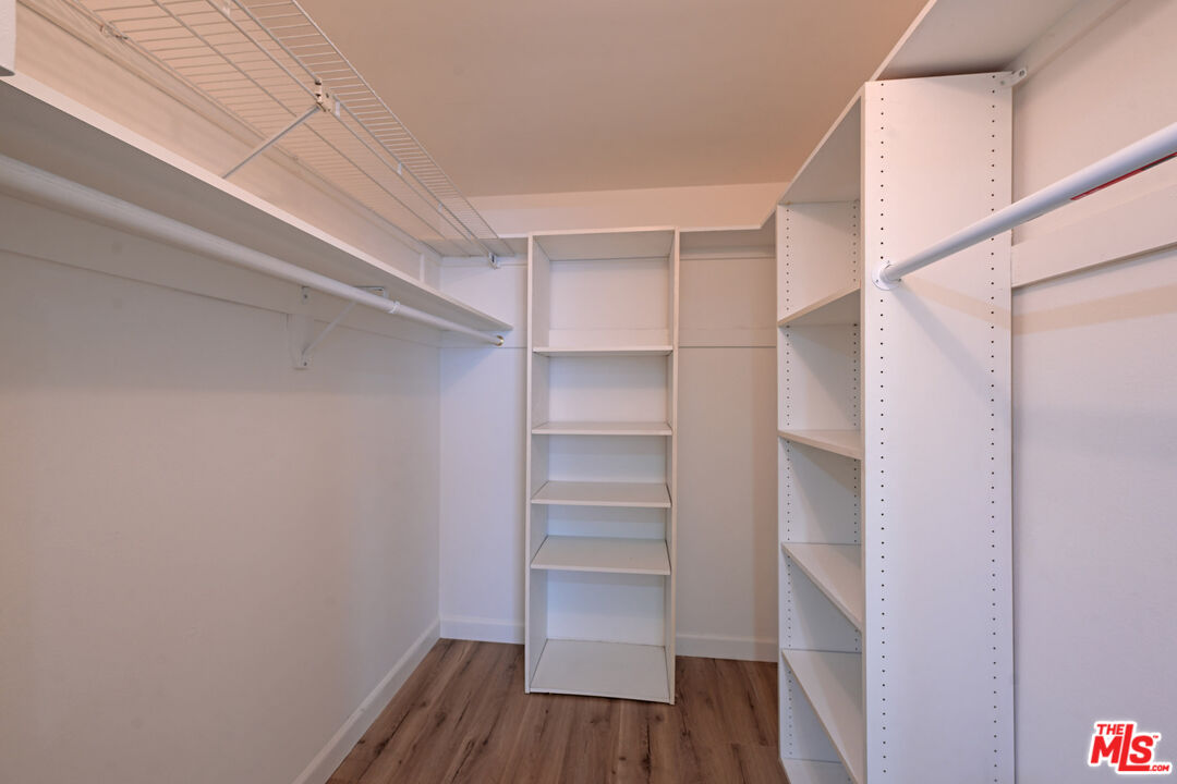 10535 Wilshire Boulevard, Unit 414 Los Angeles, CA 90024 - Photo 31 of 41 a view of walk in closet with empty racks