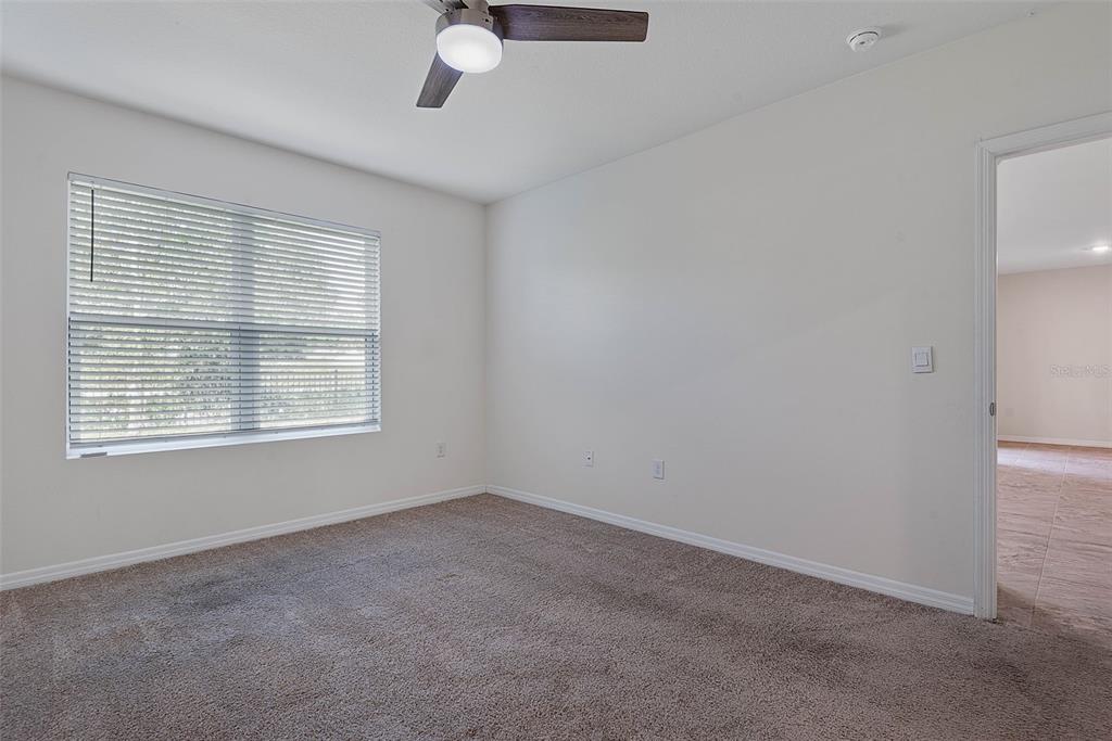 247 Old Mill Edgewater, FL 32141 - Photo 22 of 67 an empty room with a window