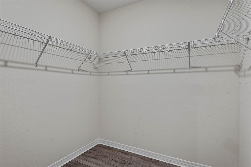 247 Old Mill Edgewater, FL 32141 - Photo 25 of 67 a view of a room with racks on the wall