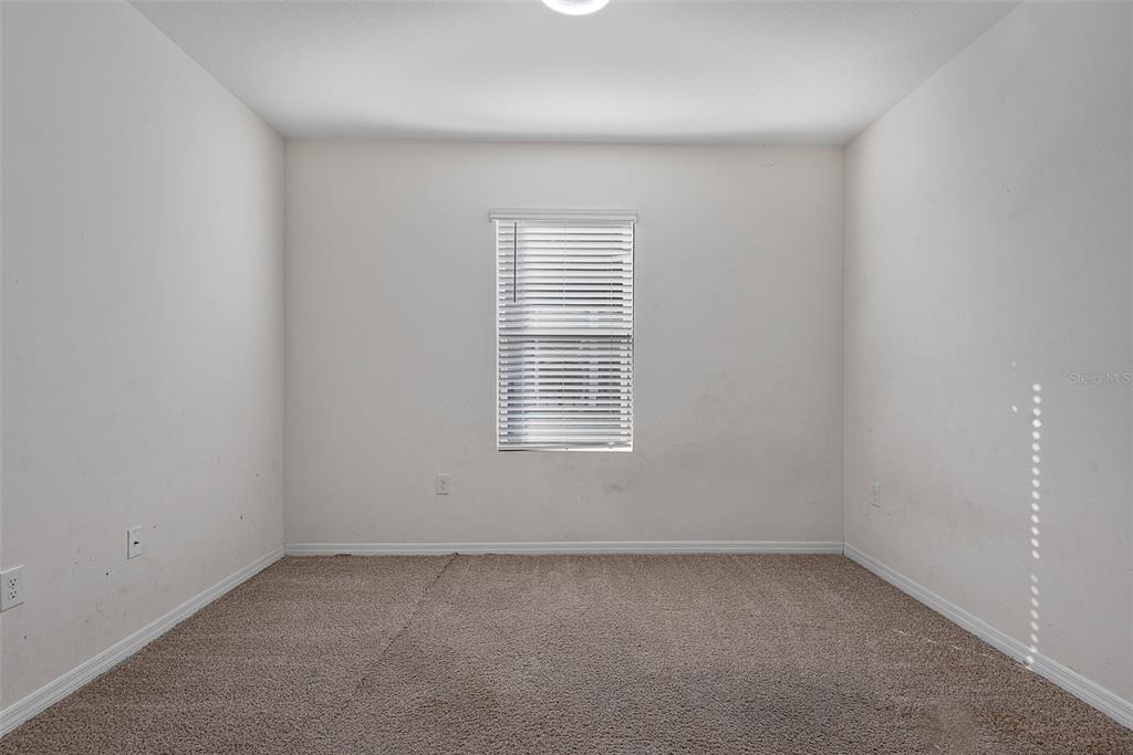 247 Old Mill Edgewater, FL 32141 - Photo 27 of 67 an empty room with a window
