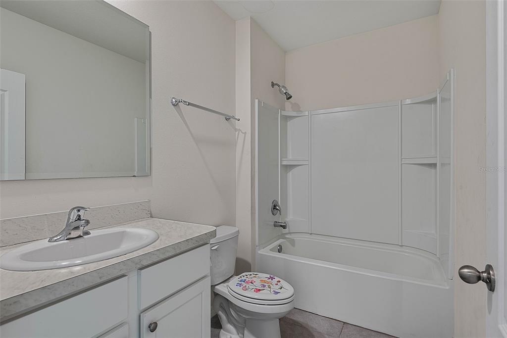 247 Old Mill Edgewater, FL 32141 - Photo 33 of 67 a bathroom with a sink toilet and a bathtub