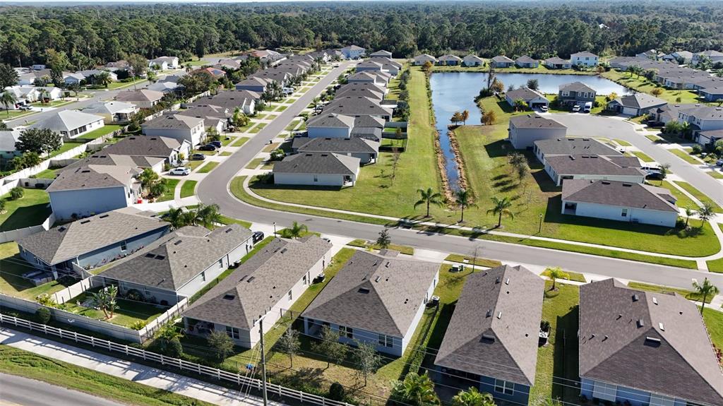 247 Old Mill Edgewater, FL 32141 - Photo 49 of 67 an aerial view of a house with a swimming pool