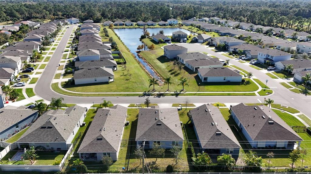 247 Old Mill Edgewater, FL 32141 - Photo 50 of 67 an aerial view of multiple houses