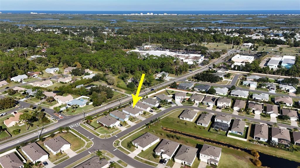 247 Old Mill Edgewater, FL 32141 - Photo 54 of 67 an aerial view of a city with lots of residential buildings