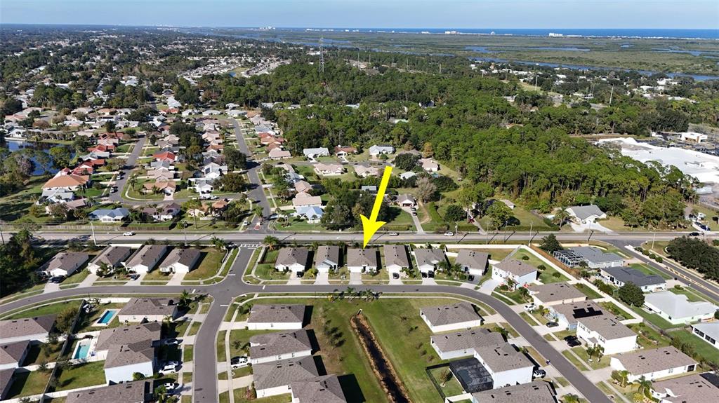 247 Old Mill Edgewater, FL 32141 - Photo 55 of 67 an aerial view of residential houses with outdoor space