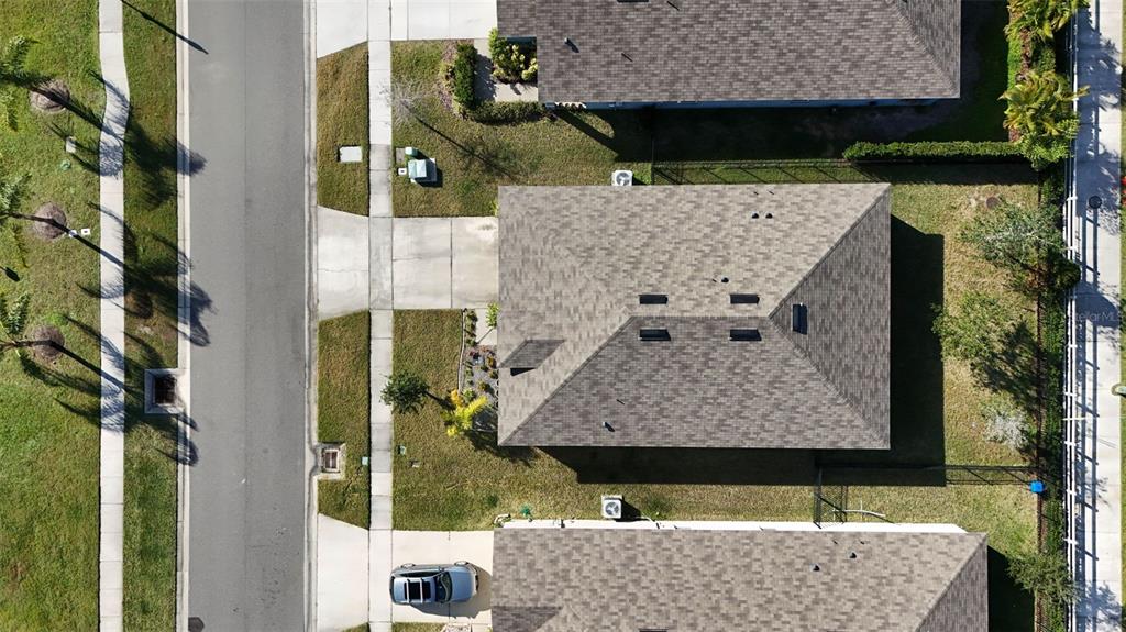 247 Old Mill Edgewater, FL 32141 - Photo 60 of 67 aerial view of a house with a yard