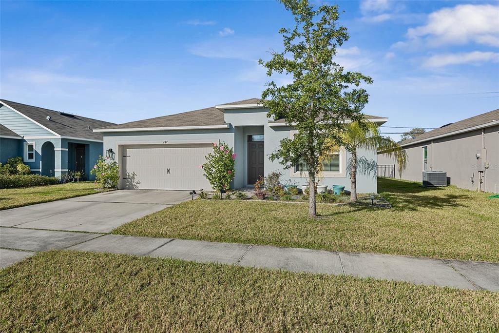 247 Old Mill Edgewater, FL 32141 - Photo 65 of 67 a front view of a house with garden