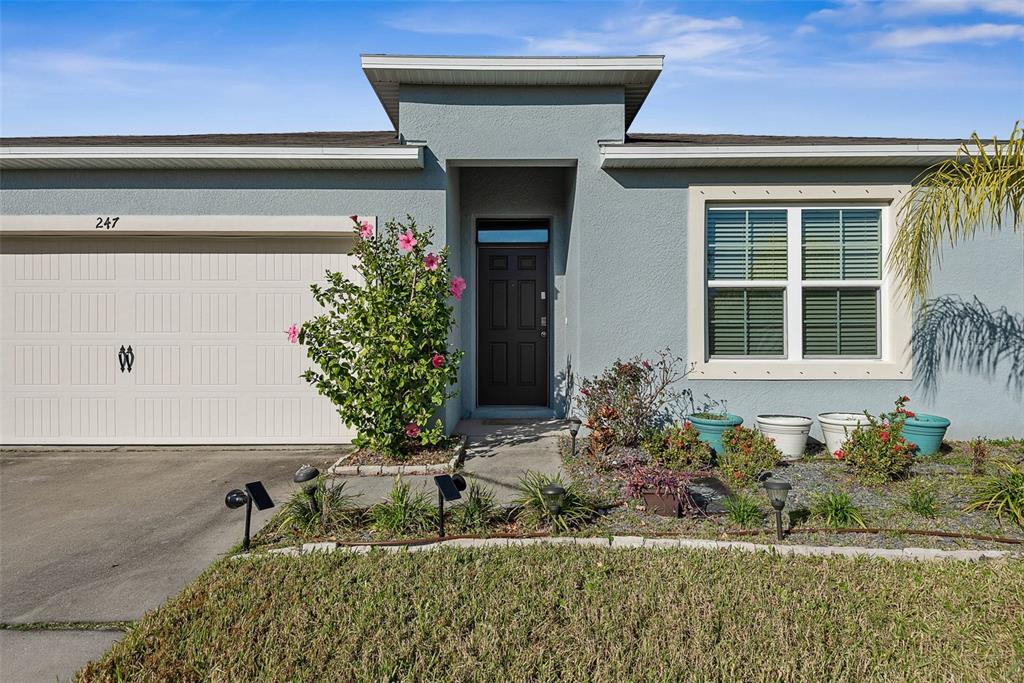 247 Old Mill Edgewater, FL 32141 - Photo 67 of 67 a front view of a house with a yard