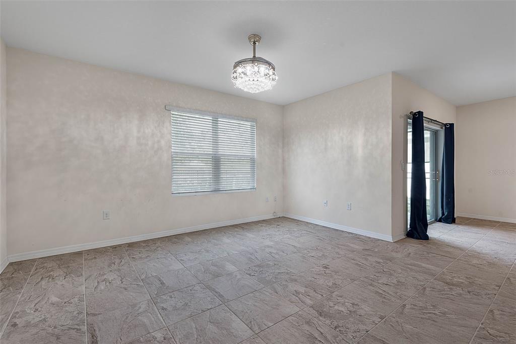 247 Old Mill Edgewater, FL 32141 - Photo 9 of 67 a view of an empty room with a window