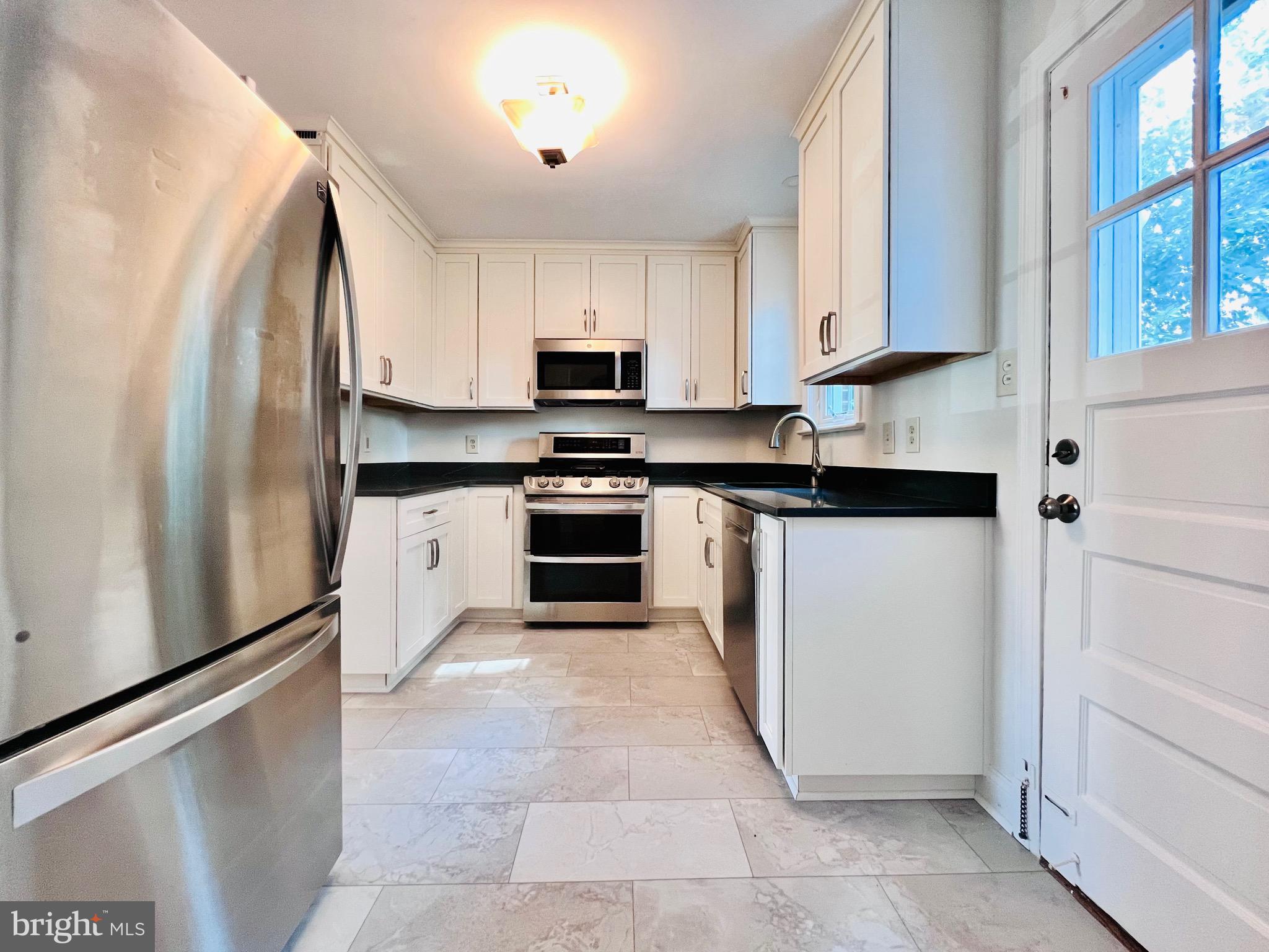 7208 Exeter Road Bethesda, MD 20814 - Photo 6 of 26 SS appliances