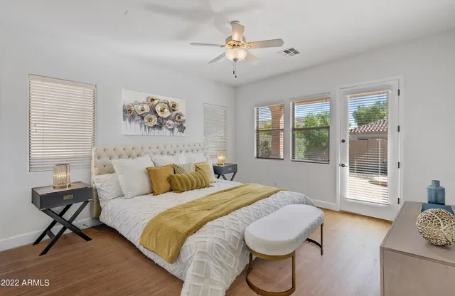 a bathroom with a double vanity sink and mirror