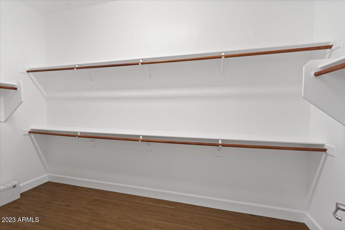 2413 West Sienna Bouquet Place Phoenix, AZ 85085 - Photo 30 of 61 a close up view of racks on the wall