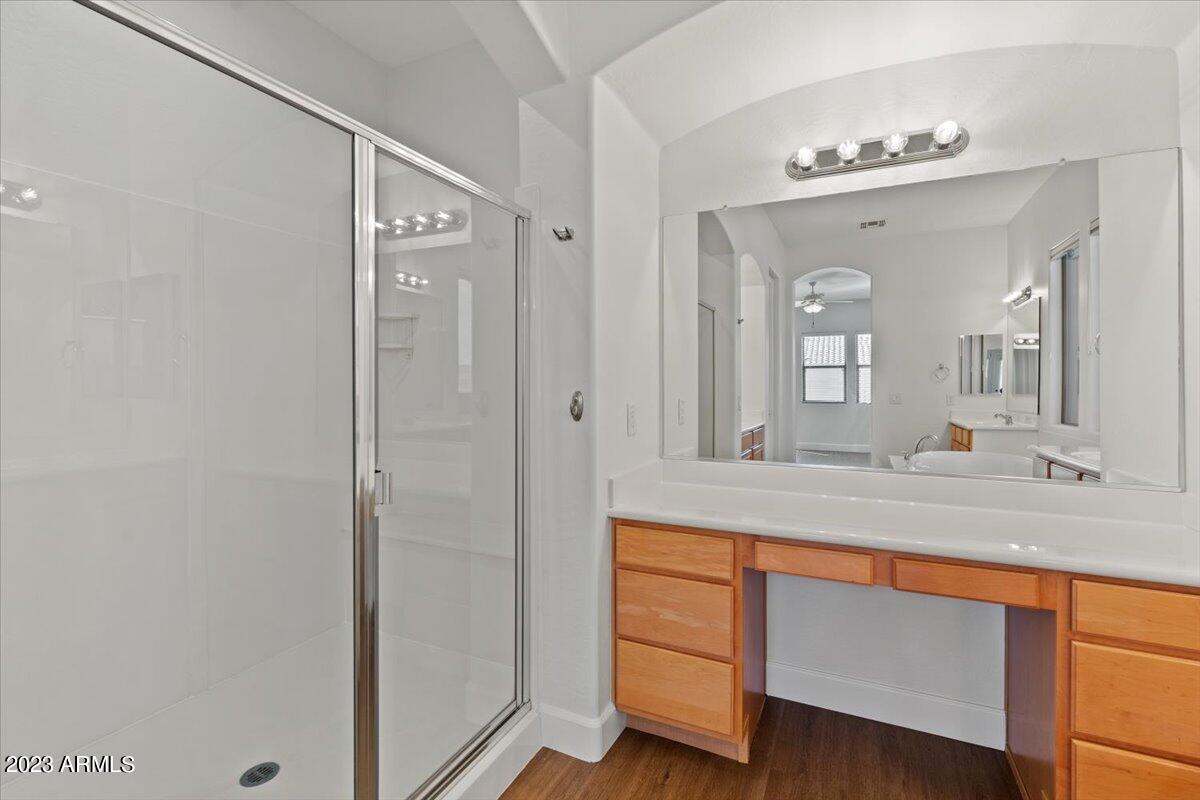 2413 West Sienna Bouquet Place Phoenix, AZ 85085 - Photo 33 of 61 a bathroom with a double vanity sink and mirror