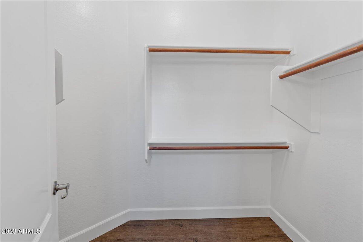 2413 West Sienna Bouquet Place Phoenix, AZ 85085 - Photo 40 of 61 a view of small space with racks on the wall