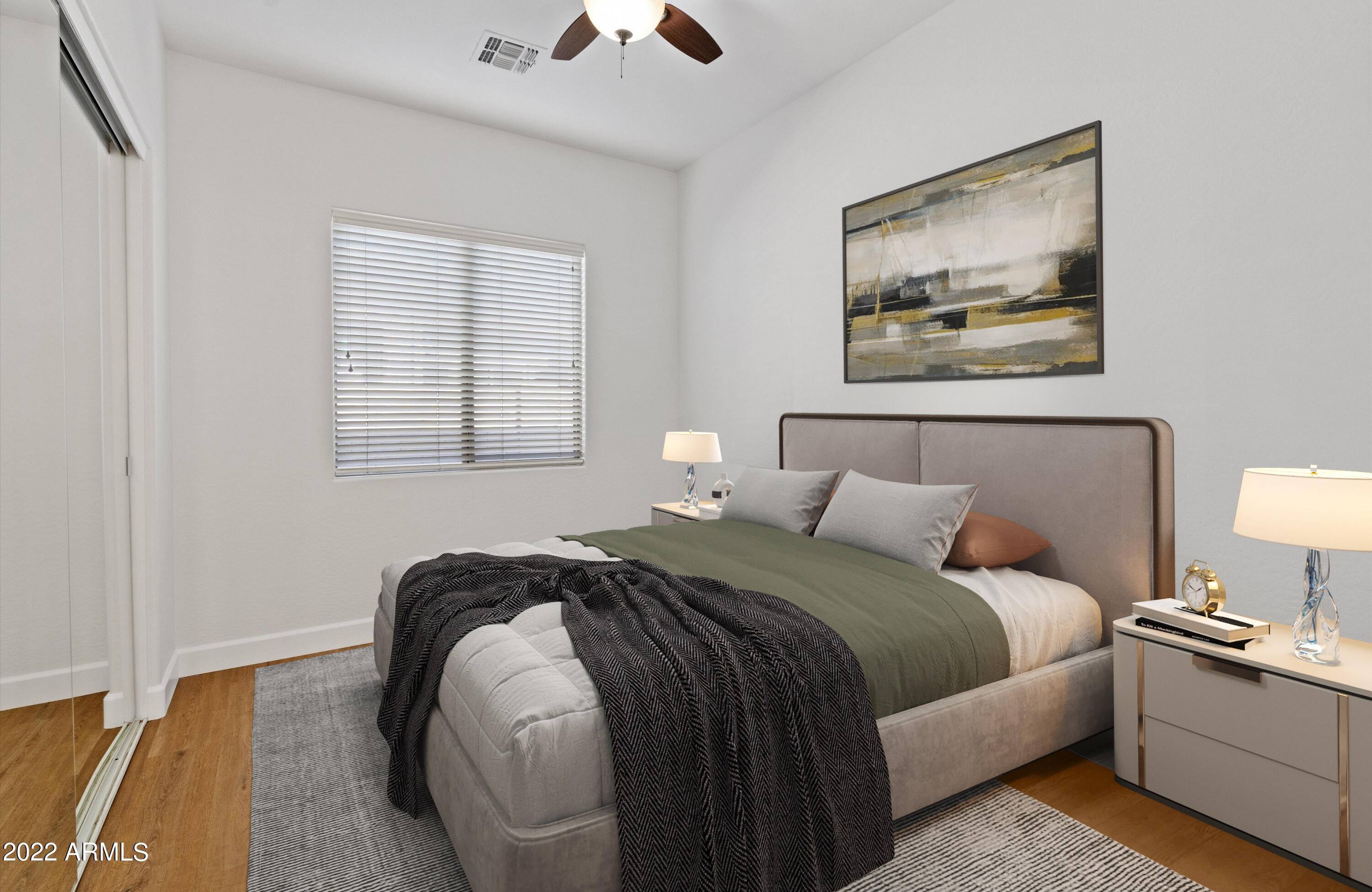 2413 West Sienna Bouquet Place Phoenix, AZ 85085 - Photo 43 of 61 a bedroom with bed and a night stand