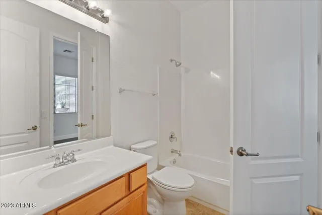 an aerial view of residential houses and outdoor space