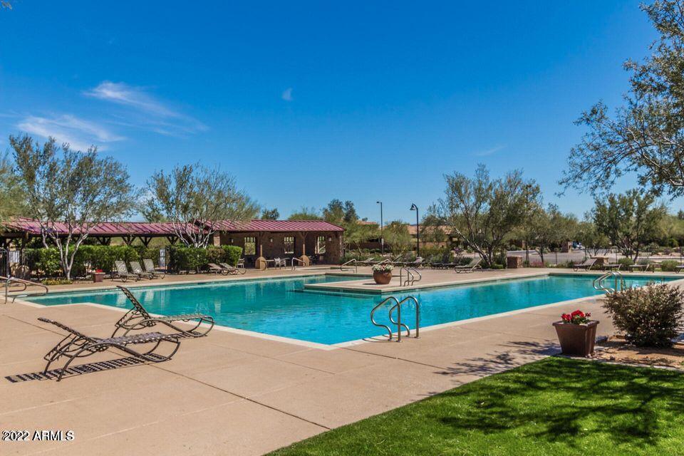 2413 West Sienna Bouquet Place Phoenix, AZ 85085 - Photo 50 of 61 a view of a swimming pool and a garden