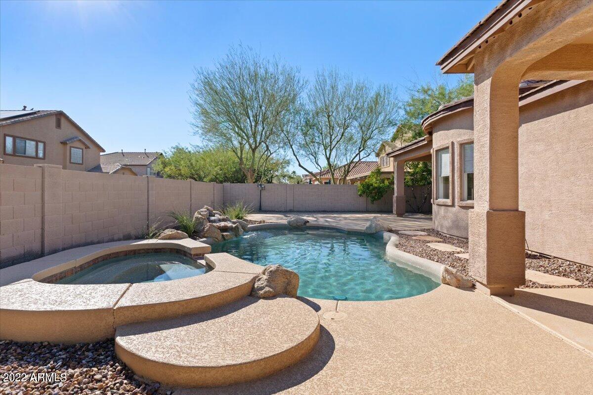 2413 West Sienna Bouquet Place Phoenix, AZ 85085 - Photo 5 of 61 a view of a back yard of the house