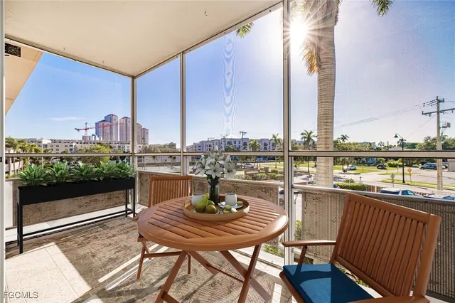 a view of a balcony with chairs