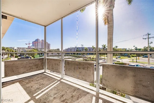 a view of a balcony with city view