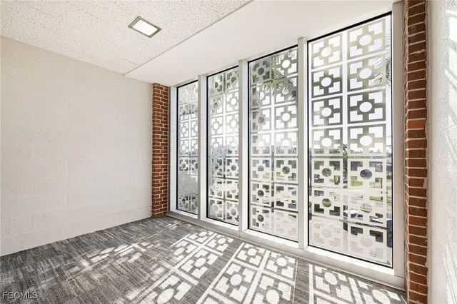 a view of a swimming pool and an outdoor space