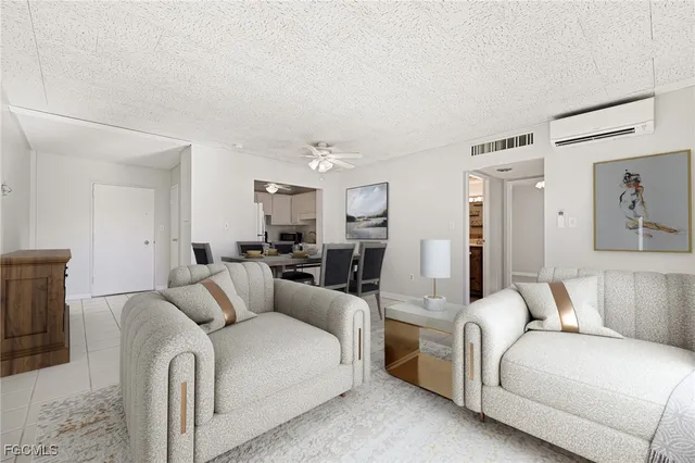 a living room with furniture and a couch