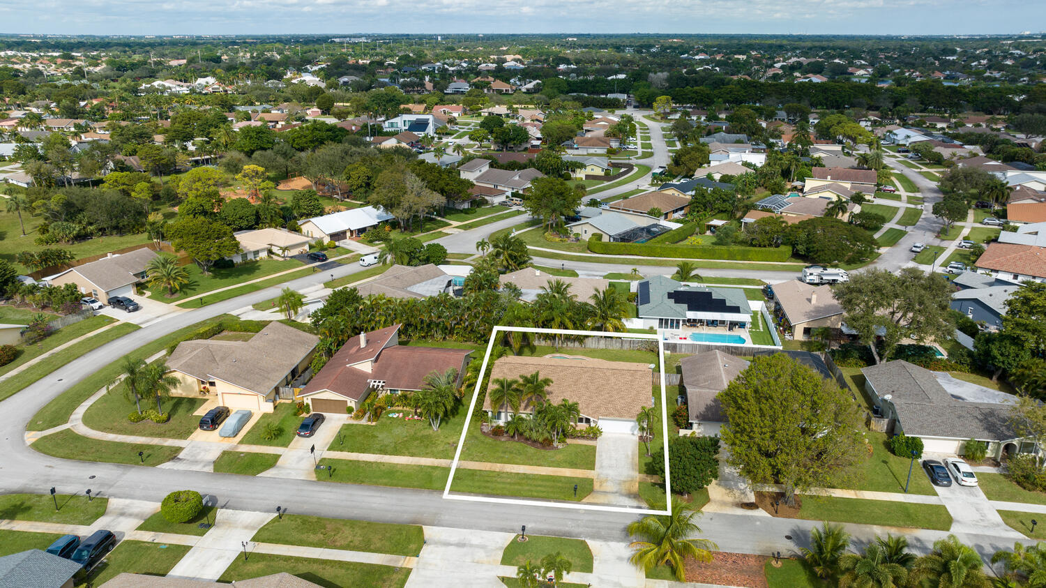 4695 Brandywine Drive Boca Raton, FL 33487 - Photo 25 of 28 an aerial view of residential houses with outdoor space and parking