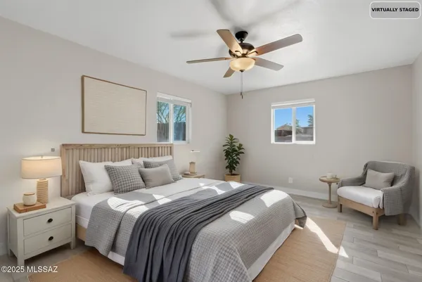 a bedroom with a large bed and a window
