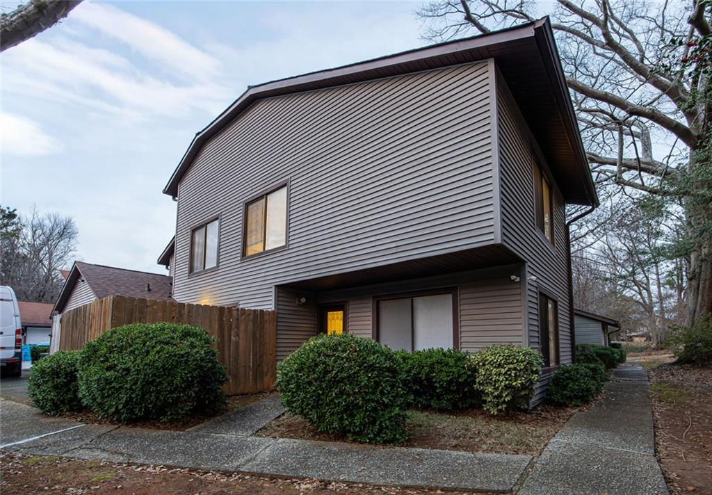 2739 Whitewater Court Austell, GA 30106 - Photo 2 of 18 a front view of a house with a garden