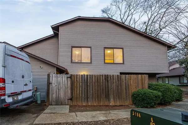 a front view of a house with a garage