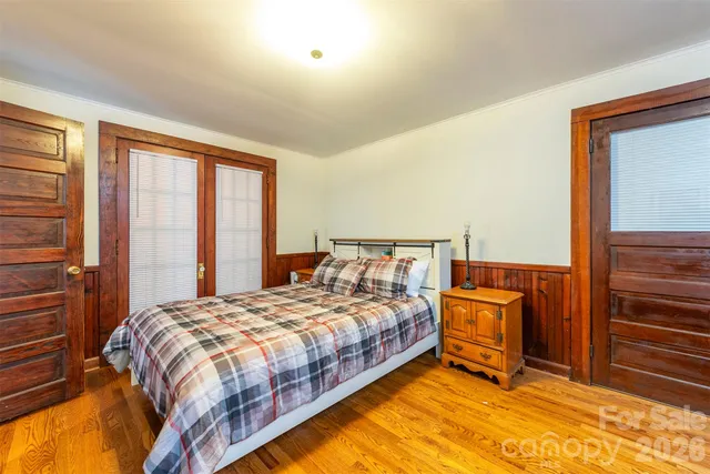 a bedroom with a bed and a cabinets