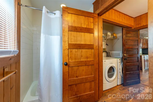 a utility room with dryer and washer