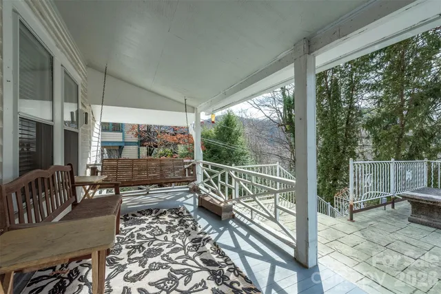 a view of a two chair in the balcony