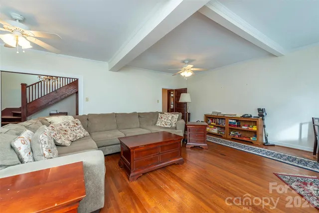 a living room with furniture and a couch