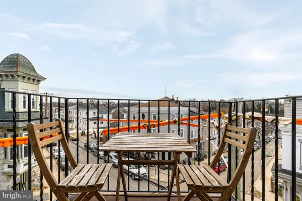 a balcony with a city view