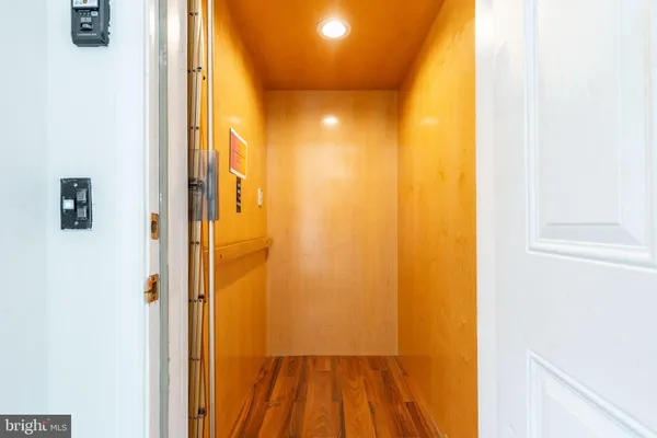 a view of a bathroom with a glass door