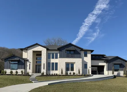 front view of a house with a swimming pool