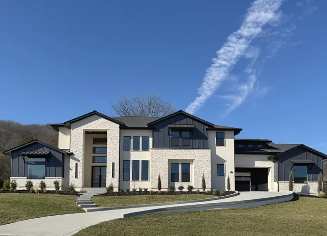 front view of a house with a swimming pool